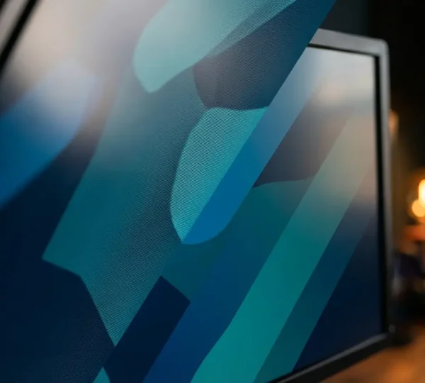 Close-up view of digital vector art transforming from pixelated to crystal-clear resolution on a high-DPI display